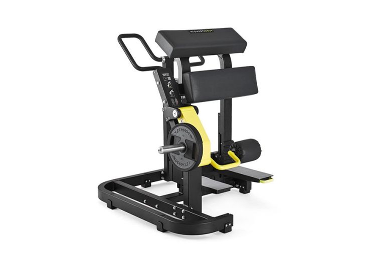 Нагружаемый дисками тренажер Technogym PURE STRENGTH Standing Leg Curl 