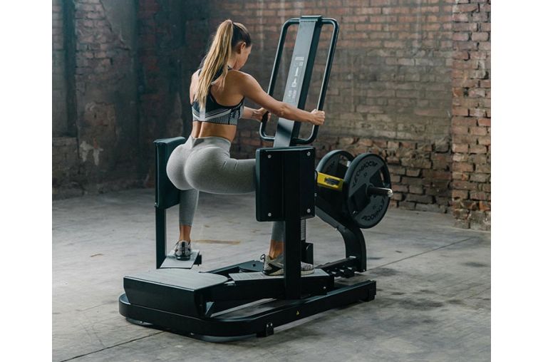 Нагружаемый дисками тренажер Technogym PURE STRENGTH Standing Abductor фото 2